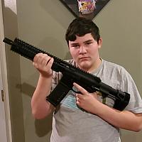 Isaiah with AR Pistol
